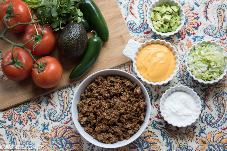 Crunchy taco bowls are filled with yummy, cheesy, gooey goodness. Make these for the big game, your next party, or a fun spin on a staple meal in your home. - Crunchy Taco Bowls Recipe by popular Arkansas lifestyle blogger Maune Legacy
