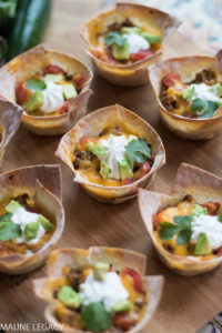 Crunchy taco bowls are filled with yummy, cheesy, gooey goodness. Make these for the big game, your next party, or a fun spin on a staple meal in your home. - Crunchy Taco Bowls Recipe by popular Arkansas lifestyle blogger Maune Legacy