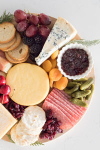 Top Arkansas lifestyle blogger, Jennifer from Maune Legacy, shares 9 must haves for a Festive Charcuterie Tray inluding ingredient list and entertaining tips!