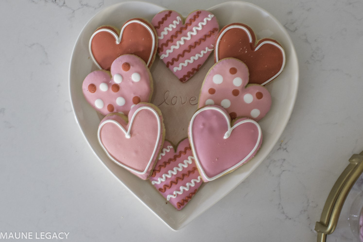 heart shaped platter with decorated heart cookies