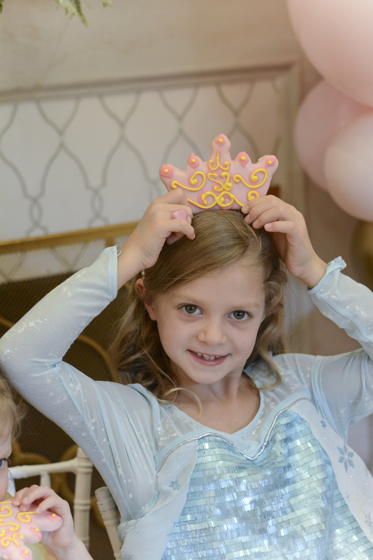 This magical Disney Princess Christmas Ball Birthday Party is full of party inspiration for your birthday princess. Disney Princesses were on hand to dance and celebrate, all while the girls enjoyed a tea party. Check out these Disney Princess birthday party ideas shared by top blogger, Jennifer Maune.