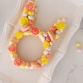 Easter Cream Tart Cake Recipe A festive and easy Easter dessert, this Easter Cream Tart Cake Recipe is almost too pretty to eat! With a buttery tart crust and cream buttercream filling, this bunny cream tart is fun to make and perfect for your Easter table!