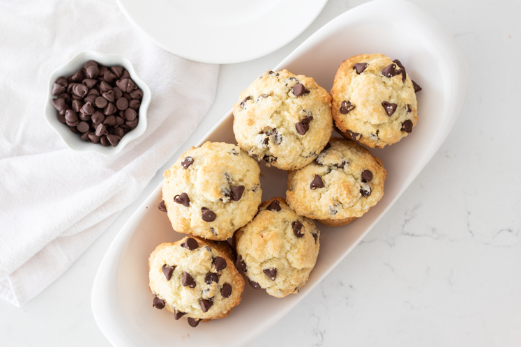 The Best Chocolate Chip Muffin Recipe that is fluffy, soft and moist. These are not only pretty, but they are perfect for busy mornings or for enjoying a yummy treat.