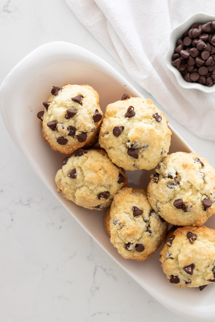 The Best Chocolate Chip Muffin Recipe that is fluffy, soft and moist. These are not only pretty, but they are perfect for busy mornings or for enjoying a yummy treat.