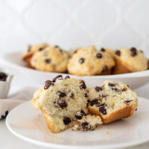 The Best Chocolate Chip Muffin Recipe that is fluffy, soft and moist. These are not only pretty, but they are perfect for busy mornings or for enjoying a yummy treat.