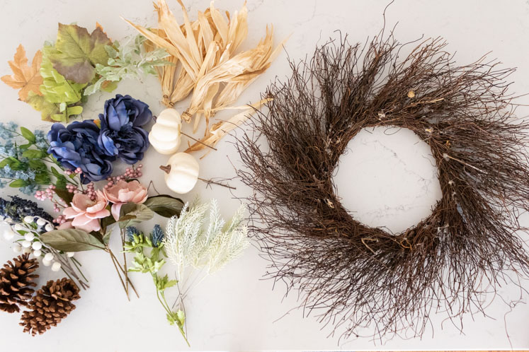 Here are 16 gorgeous and easy DIY fall wreath ideas. You'll learn how to make a fall wreath with succulents, wooden beads, yarn, fall flowers and more!