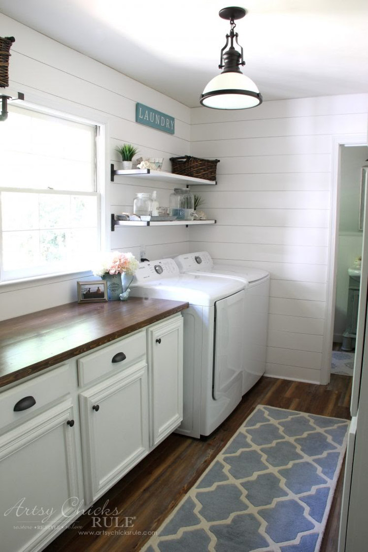 classic farmhouse laundry room with a view