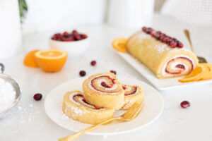 I have 13 of the Best Holiday Appetizers for you including this Cranberry Meringue Roulade that is a perfect combination of cranberry orange and sweet cream. You'll love all of these easy holiday appetizer recipes that can be served at Thanksgiving or Christmas, or any festive occasion!