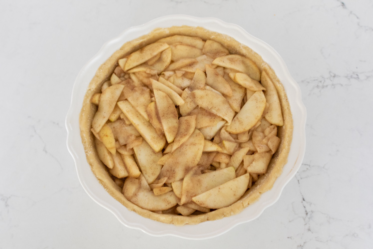 This caramel apple pie recipe is a wonderful spin on your traditional apple pie. Filled with a creamy caramel sauce, cinnamon and sugar, sweet apples, and a streusel topping, this fall pie recipe will be your favorite! Also, check out the 13 Thanksgiving Menu Ideas included to give you all the fall recipe ideas.