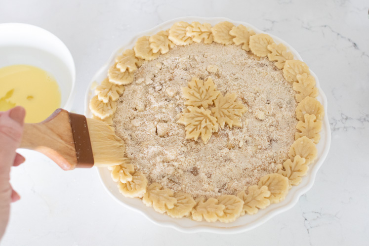 This caramel apple pie recipe is a wonderful spin on your traditional apple pie. Filled with a creamy caramel sauce, cinnamon and sugar, sweet apples, and a streusel topping, this fall pie recipe will be your favorite! Also, check out the 13 Thanksgiving Menu Ideas included to give you all the fall recipe ideas.