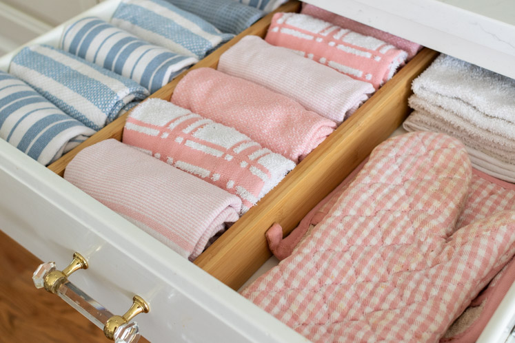 After doing an overhaul of our kitchen cabinets and drawers, I'm sharing the top 10 best Kitchen Organizing Ideas. From drawer dividers, to kitchen shelves, to organizing under the sink, you can find the best kitchen organization tools to help you organize your kitchen.