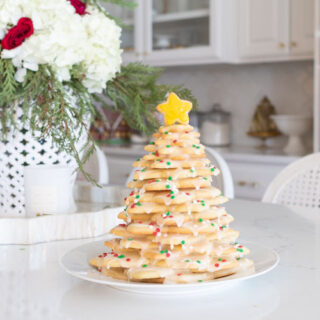 Christmas Cookie Tree This Christmas Cookie Tree Recipe is so fun to make and a festive, yummy treat for your holiday parties and special traditions. With Royal icing on top, and the wilton cookie cutter set, your kids will love helping you make these.