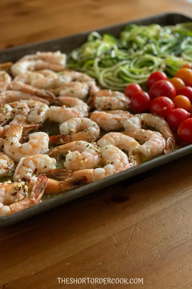 shrimp, tomatoes and zucchini on sheet pan