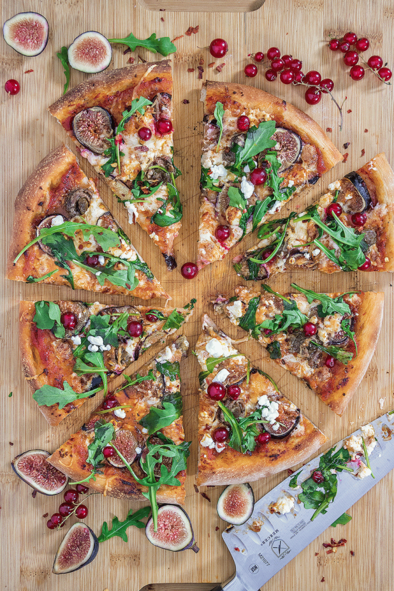 gorgeous pizza topped with figs, anchovy and goat cheese