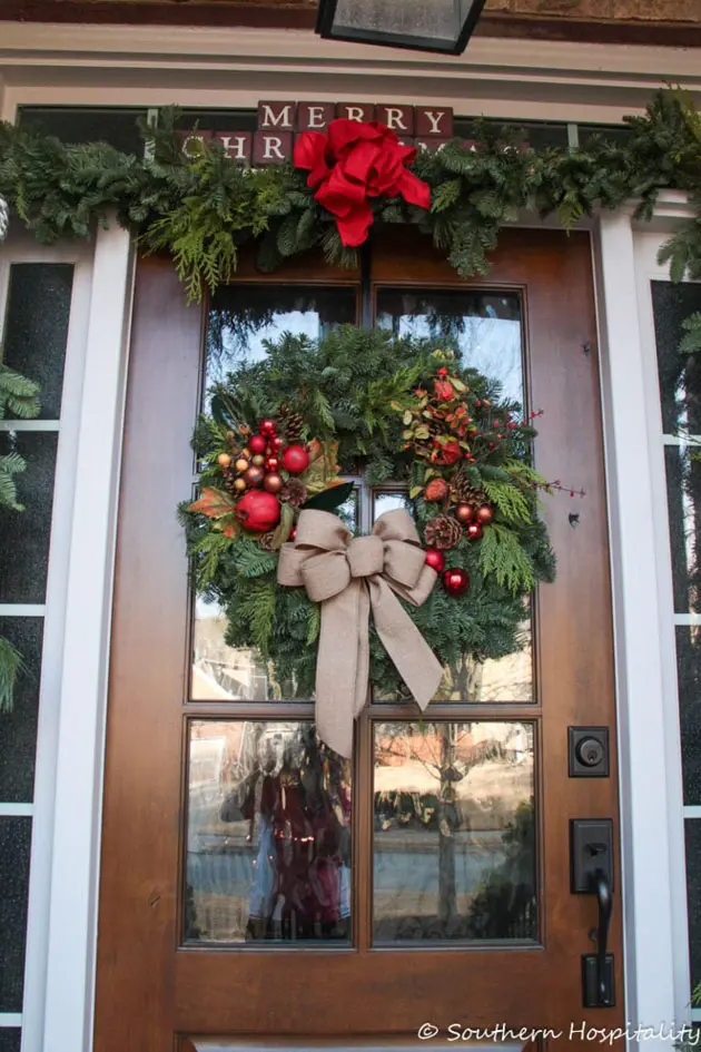 classic christmas front porch with large wreath