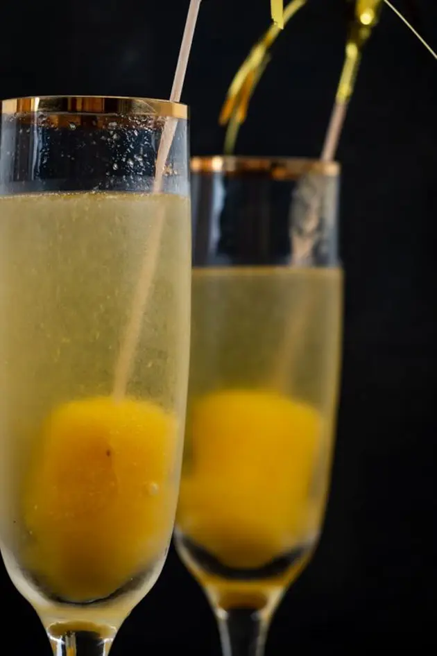 peach bellini with frozen pop inside