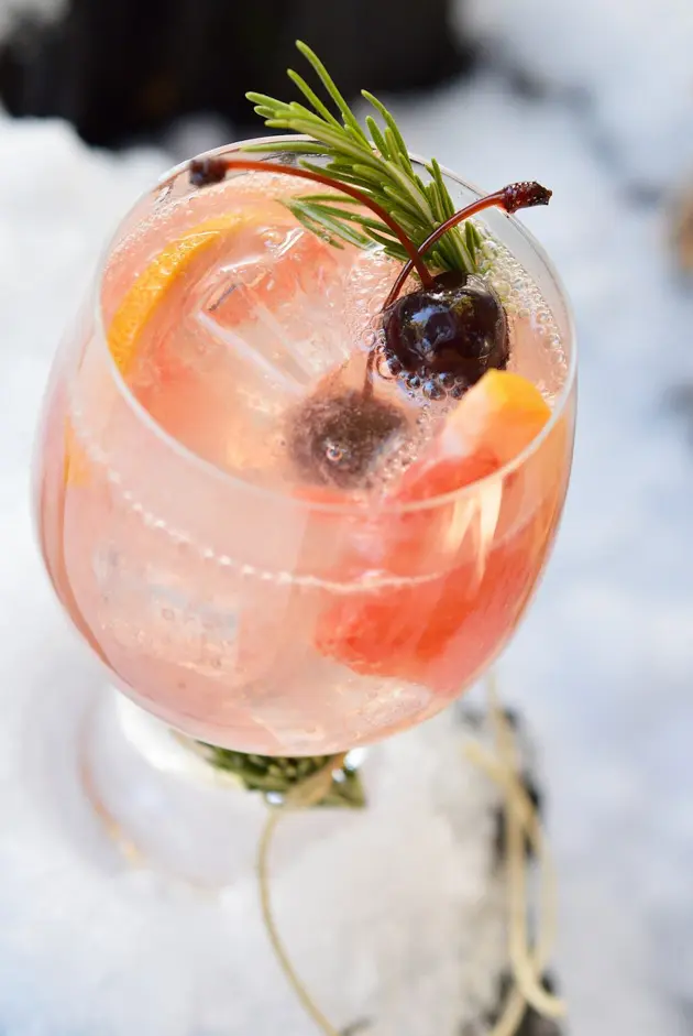 cocktail with black cherries, grapefuit and vodka