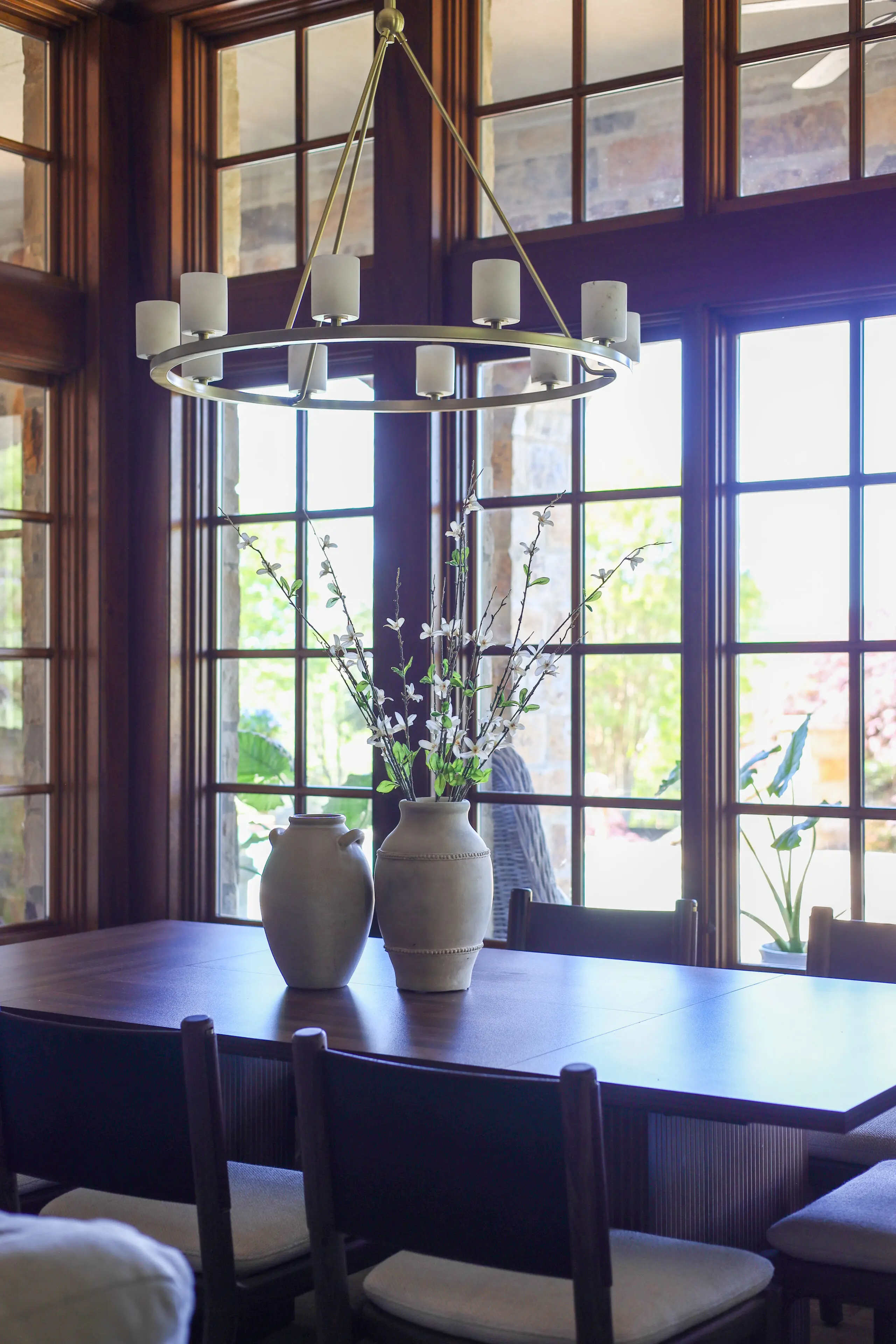 eat in kitchen table with brass chandelier